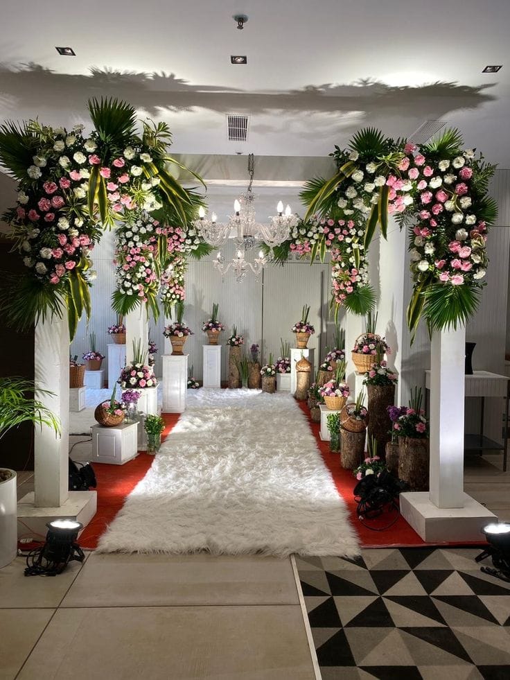 Floral pillar aisle walkway for wedding entrance